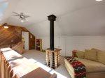 The loft has a great reading nook, games and room for extra guests to sleep 